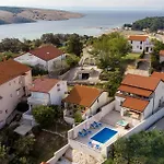 Beach Front Home In Lopar Case de vacanță *